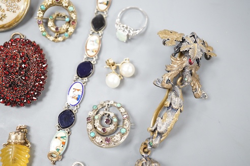 Mixed jewellery including enamelled white metal bracelet, garnet paste set brooch, pair of gilt white metal and gem set drop earrings, etc.